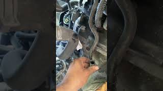 Removing transmission, dipstick and cooler line from transmission.  07-2012 Nissan Sentra