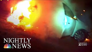 Officers Rescue Unconscious Woman From Burning Vehicle In Dramatic Video | NBC Nightly News