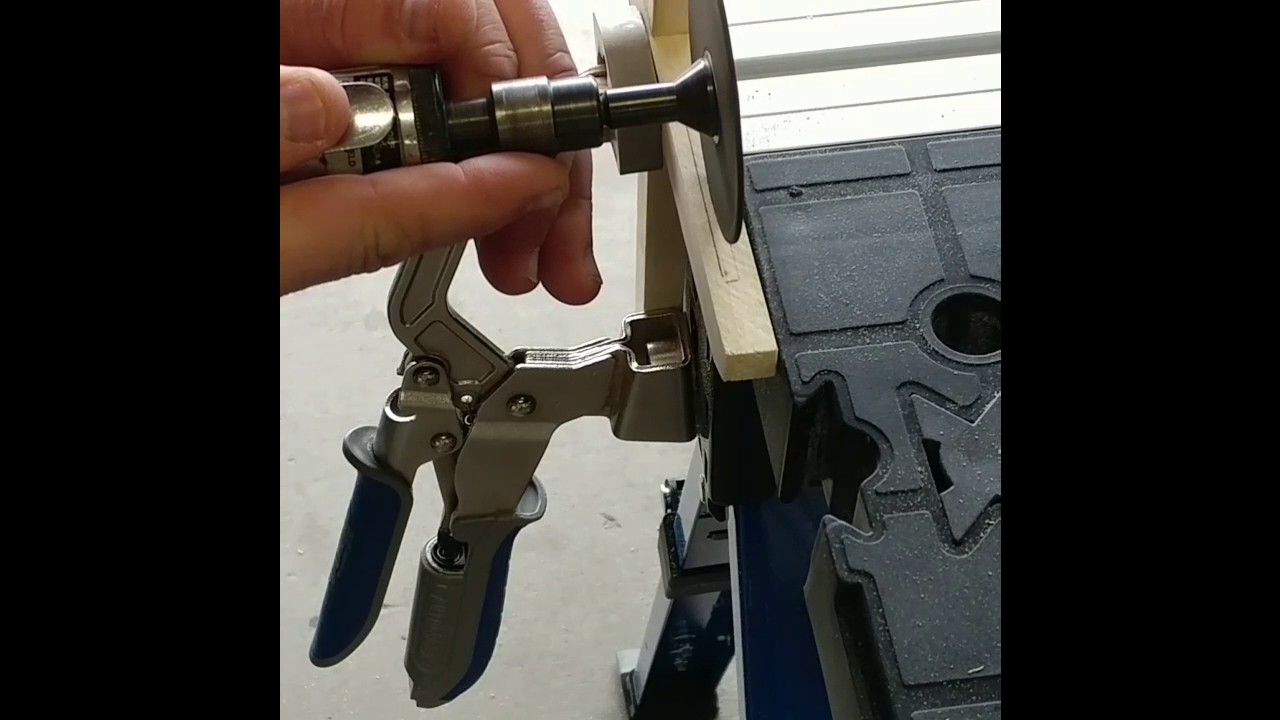 Making a realtor sign post card holder.