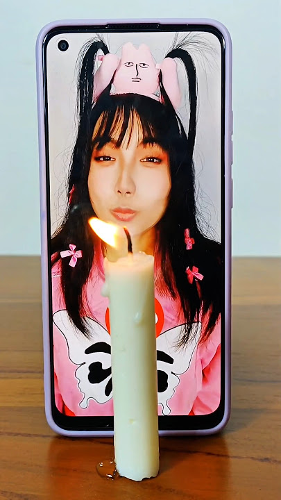 YOU CAN BLOW CANDLES FROM YOUR PHONE!! 🕯️🔥 #shorts #OliviaValent