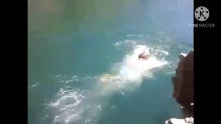 NKOYOYO QUARRY DAM spiritual things takes father whilst the child is filming