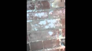 Exposing brick wall under plaster