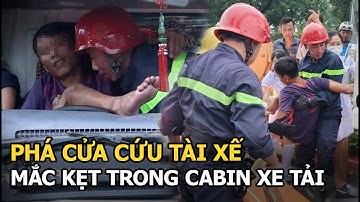 Phá cửa giải cứu nam tài xế mắc kẹt trong cabin xe tải sau va chạm ô tô 7 chỗ ở TP Hồ Chí Minh