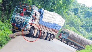 Heavy Loaded Ashok Leyland Lorry Pulling up Inclined Curve Wooden Log Hit Front Tires Truck Driving