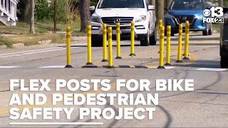 Are the new road obstacles on Washington Ave. improving safety or causing issues?