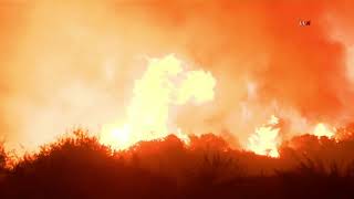 Cherry valley - cal fire/riverside county firefighters are on scene of
a wild-land fire in valley. the has multiple spots burning along oak
glen ...