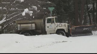 Spokane plow drivers as they work to clear snowy roads