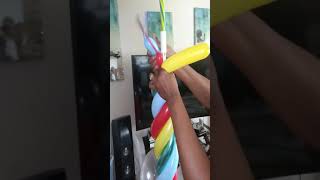 Wrapping balloons around the pole