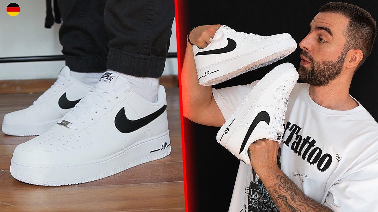 white and black air force 1 on feet