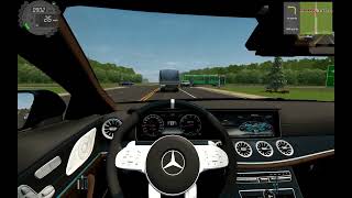 City car driving with a Mercedes cls