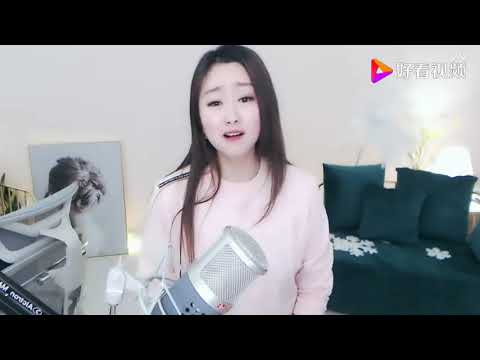 菲儿演唱《一壶老酒》一首经典老歌，挺晚的人都会哭