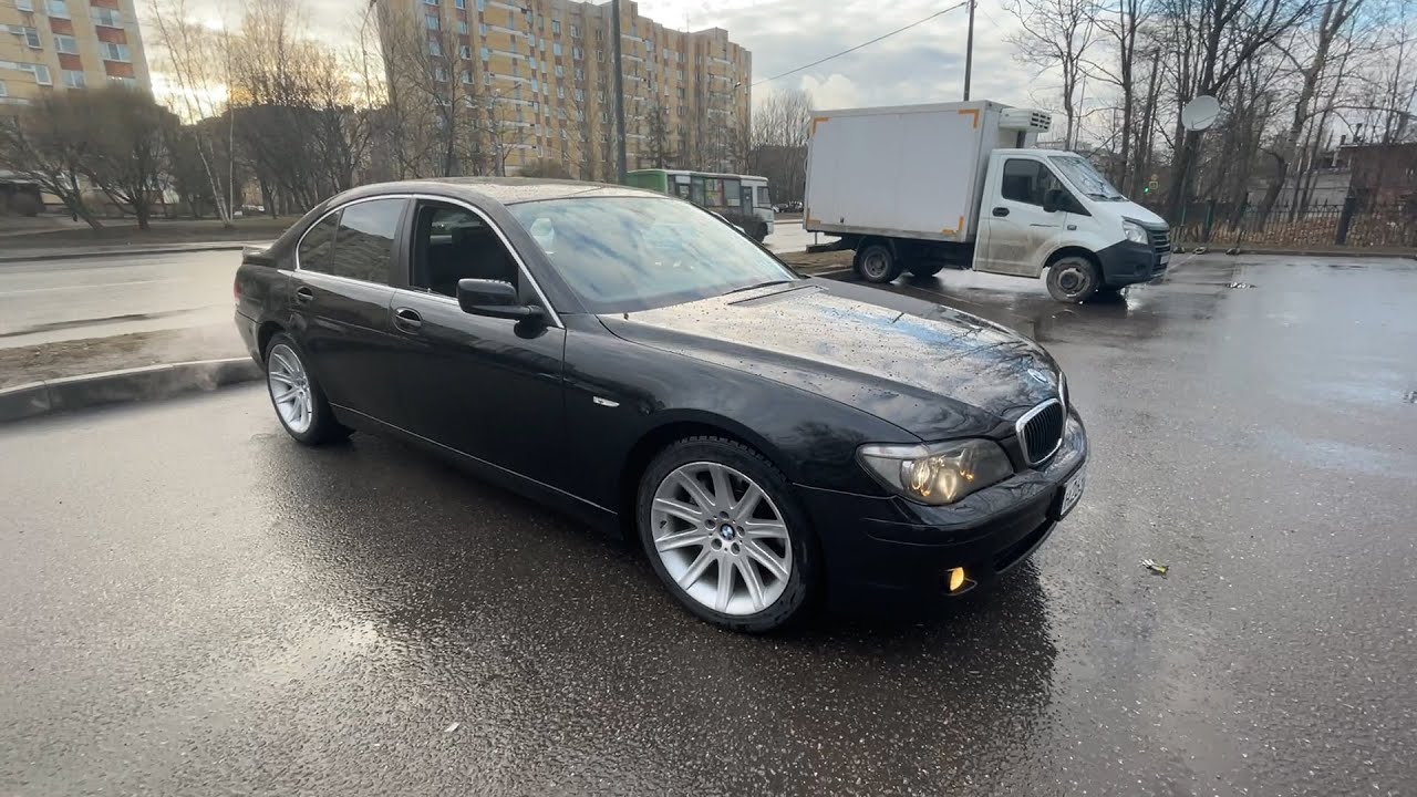 Бмв е 750