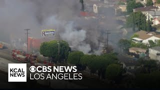 Firefighters battling large fire at tire shop in El Sereno