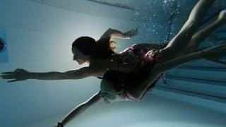 Carla underwater swimming at sunset and night