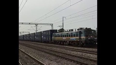 First double stack dwarf container train on electrified route of Indian railways