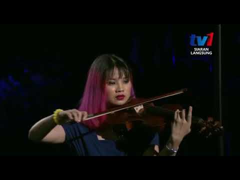 Clarence Kang performs at Asean 9th Paragames Opening Ceremony theme song- We Are One