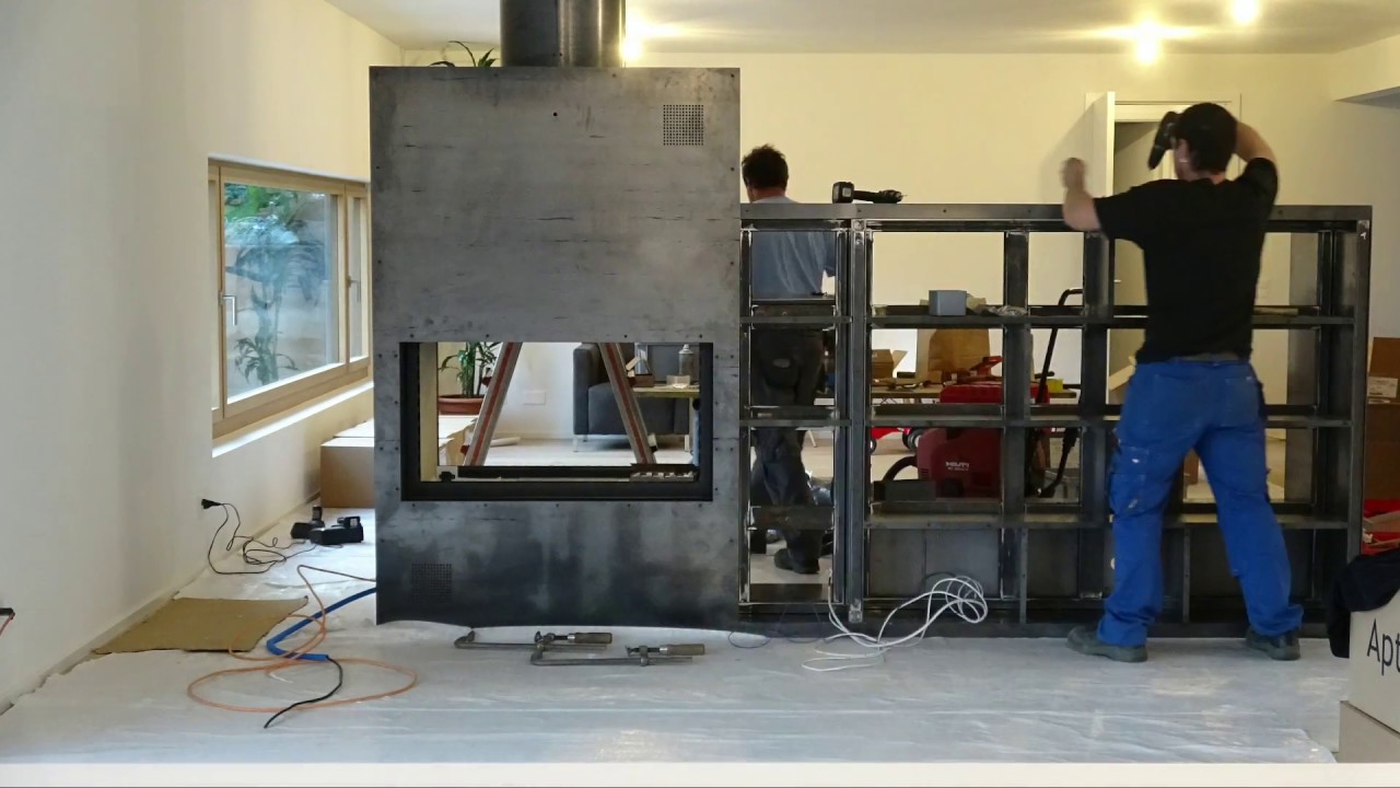 Rivestimento caminetto in acciaio, con libreria youtube