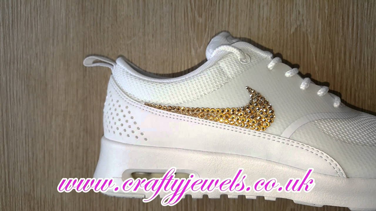 white and gold air max thea