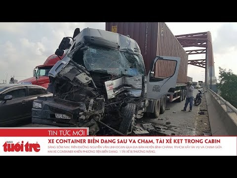 Video Xe container biến dạng sau va chạm, tài xế kẹt trong... - youtube