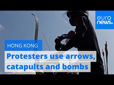 hong-kong-protesters-use-arrows,-catapults-and-petrol-bombs-against-police