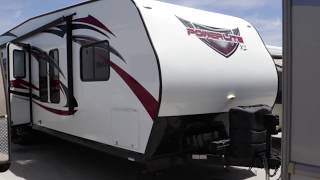Pack up the kids, the toys, and some food, and find an adventure nearby with this Powerlite XL 27FBXL toy hauler travel trailer by 