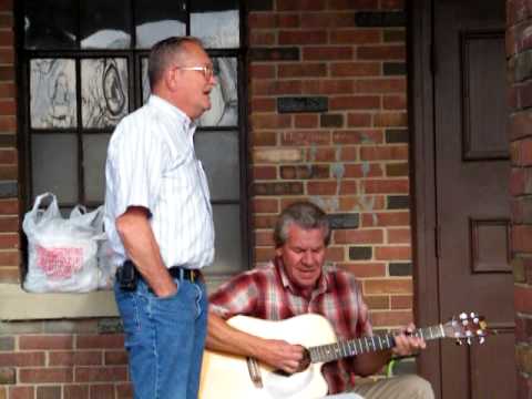 Jim, Wayne, and John singing," Nobody answers when I call your name"