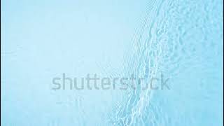 stock footage crystal clear water background pure blue water with light reflections in slow motion n