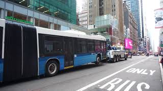 NYC Bus: NIS LFS Artic 5851 Under Tow at 6 Av/42 St