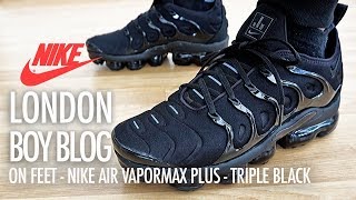 vapormax plus triple black on feet