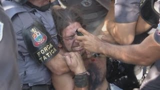 2014 World Cup: Protester 'pepper sprayed' by police in World Cup demo screenshot 2