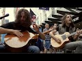 Guitar duo opal ocean go crazy playing fast and loud in the street