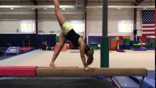 Needle Handstand on Beam