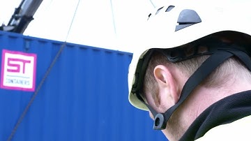 Lifting and Delivering a shipping container or cabin with a lorry loader crane / hiab vehicle