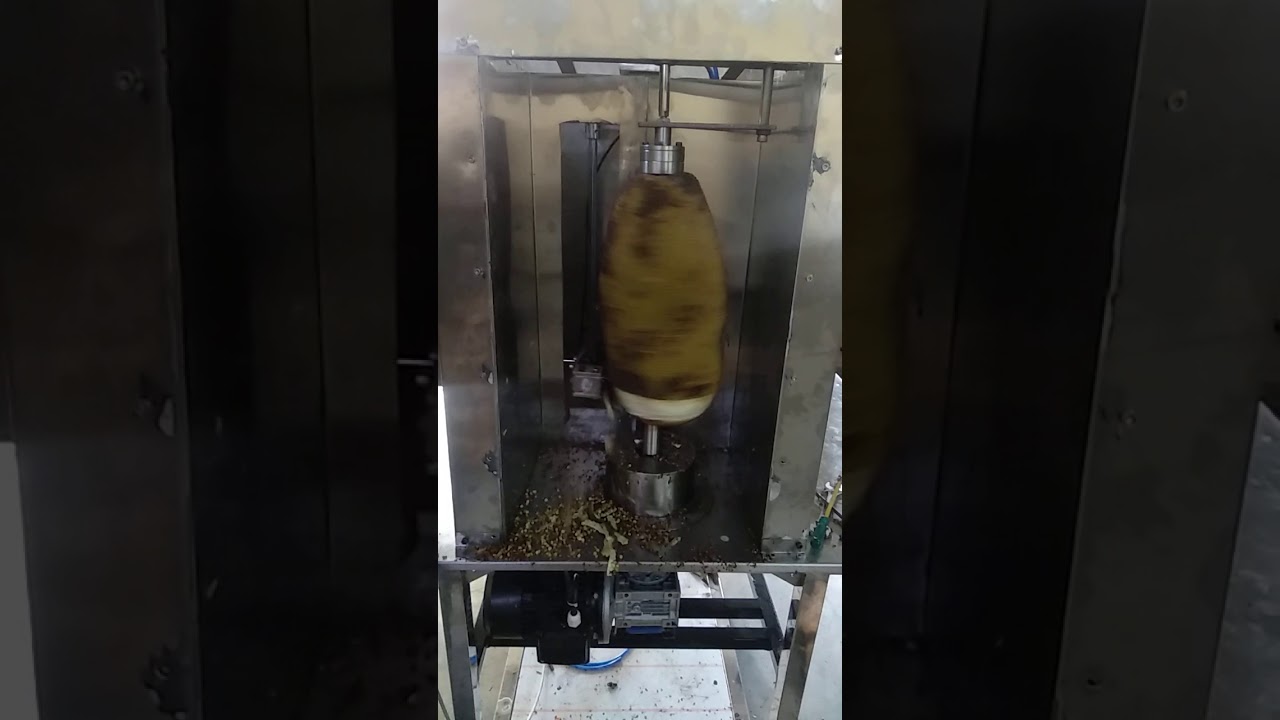Automated jackfruit skin peeling machine