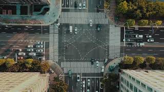 Aerial View Of A Traffic On A Intersection Road In A City