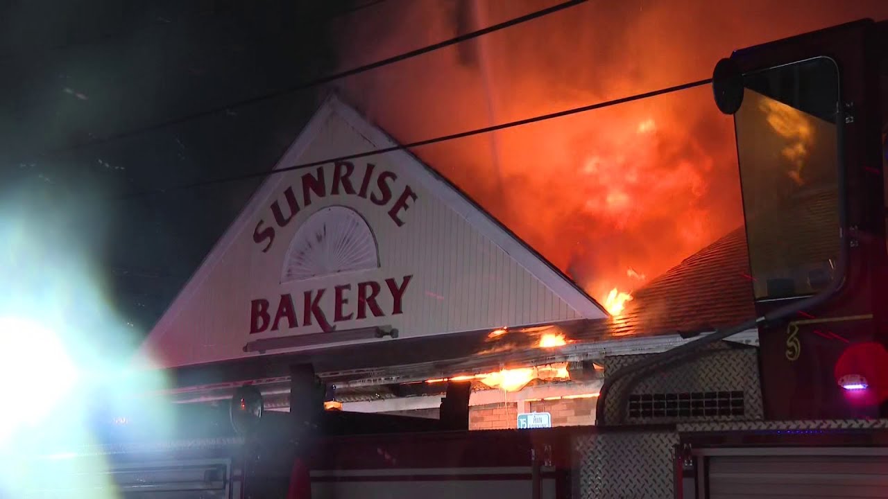 Fire rips through New Bedford bakery - YouTube