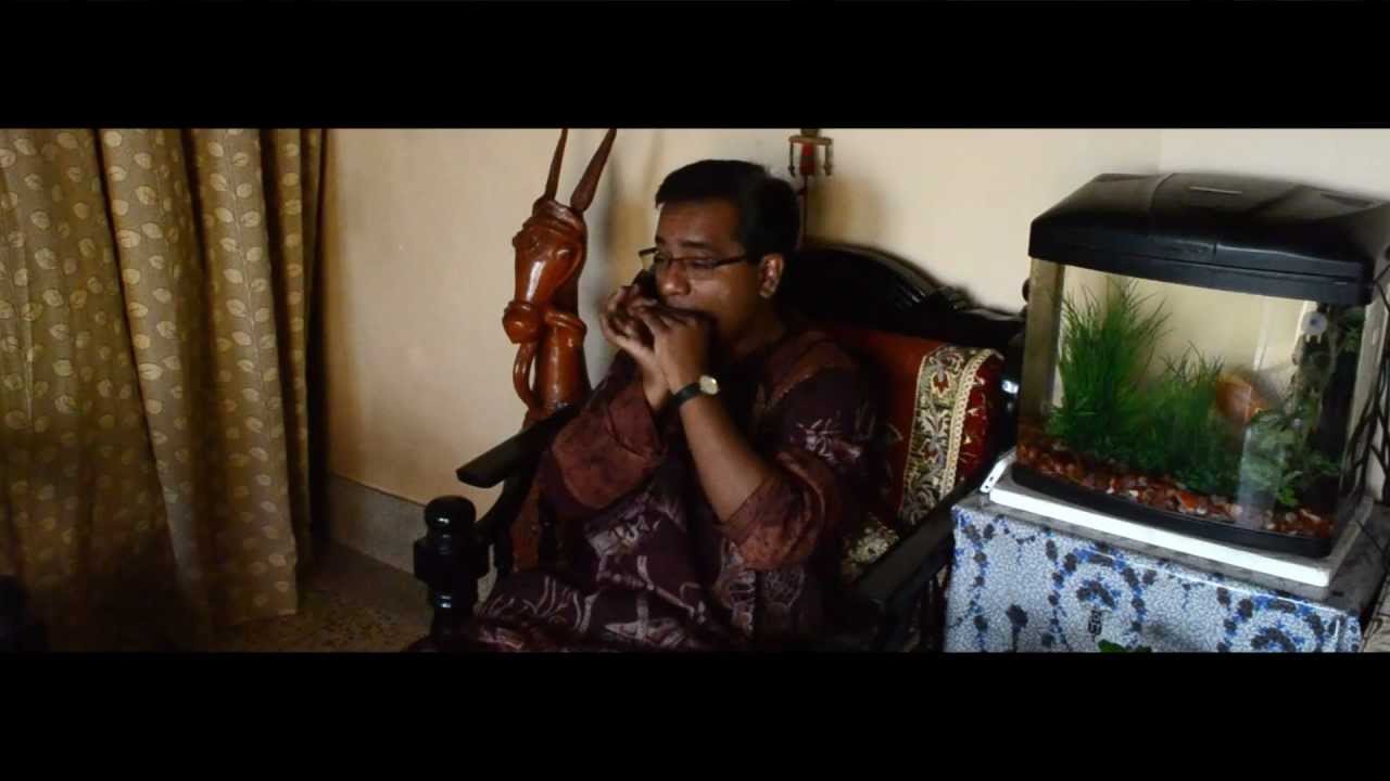 Ja re, ja re ure ja re pakhi  :: Sumanta Basu on the Harmonica