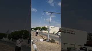 mid hinged pole with two luminaires
