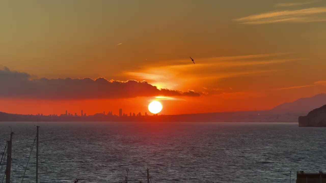 Puesta del sol Puerto Calpe Real Club Náutico vistas a Benidorm