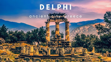 Drone Fly over mountain and ancient city in Delphi Greece