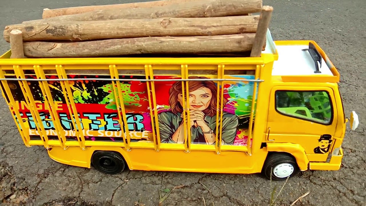 SIKSA RC  TRUK  OLENG  KASIH MUATAN KAYU DI RC  TRUK  OLENG  