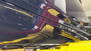 Preparing the underside of a late model Phantom for judging at the RROC National Meet