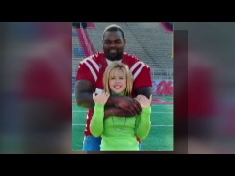 Leigh Ann Touhy and Michael Oher Celebrate Super Bowl Victory