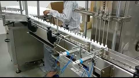 EYE DROPS FILLING AND CAPPING MACHINE
