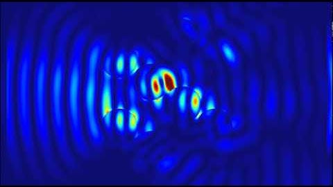 Tightly focused Gaussian beam interacting with spheres (n= 1.5) by parallel 3-D FDTD