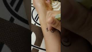 check the new name tattoo with mehndi cone - HENNA ART