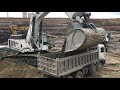 Liebherr 984 excavator loading trucks with two passes  sotiriadis ate