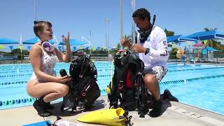 Female Scuba Diver Learns To Dive In Pool