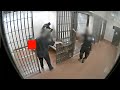 Chicago cop beats man in holding cell as another holds him down