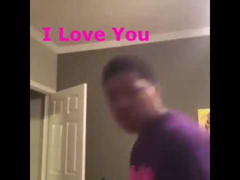 black-kid-entering-room-to-say-i-love-you-in-pink-text-then-leaving-the-room-with-arcade-song